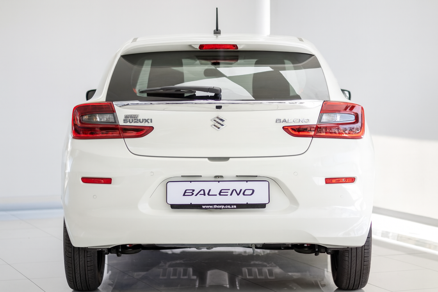 2025-White-Suzuki-Baleno-15-GL-8645146-3-1536x1024-1.jpg